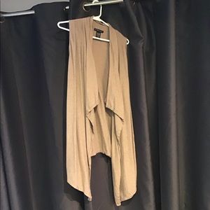 Tan, sleeveless shrug
